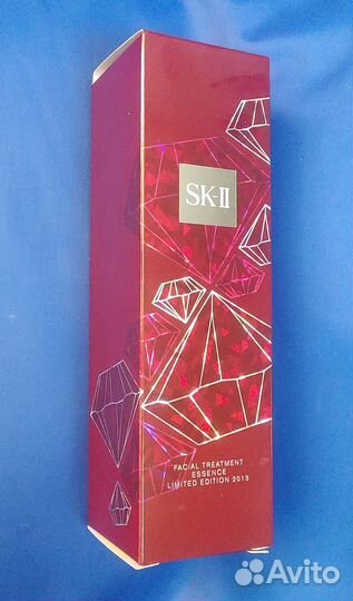 Пустая коробка и бутылка из-под SK II