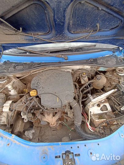 Двигатель на renault logan 1.6