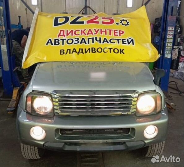 Амортизатор задней двери задний Suzuki Jimny