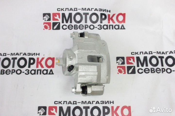 Суппорт тормозной передний левый Nissan Patrol