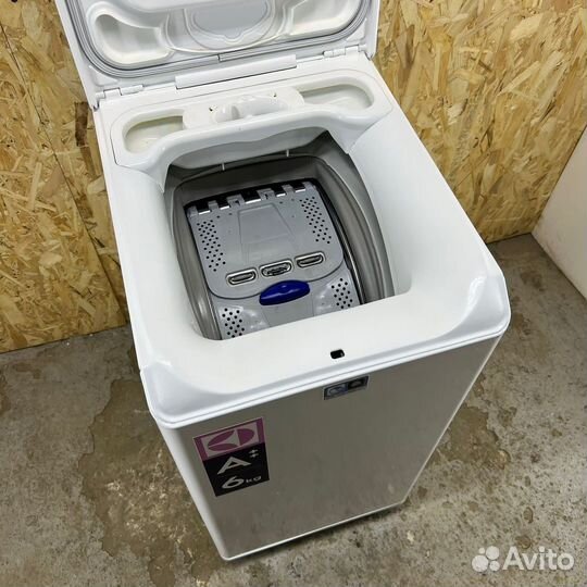 Стиральная машина с вертикальной загрузкой 6