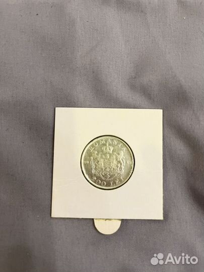 Монета серебряная