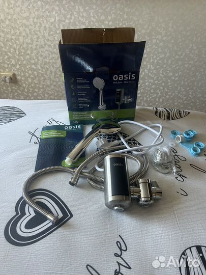 Проточный электрический водонагреватель