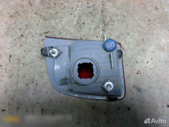 Фонарь задний в бампер левый Toyota Land Cruiser