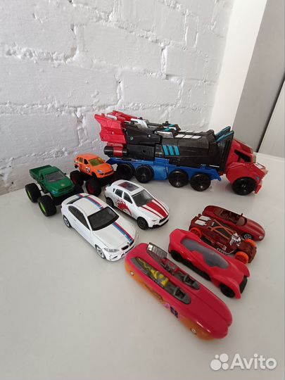 Трансформер Оптимус прайм + машинки hot wheels