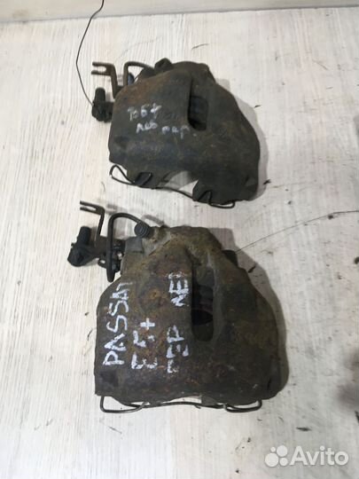 Суппорт тормозной передний левый Пассат Б5