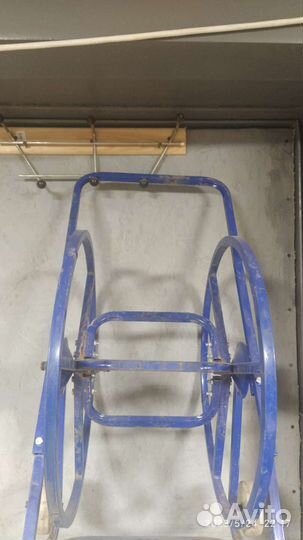 Катушка с колесами для садового шланга