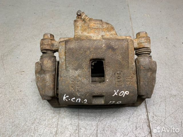 Суппорт тормозной передний правый Kia Spectra