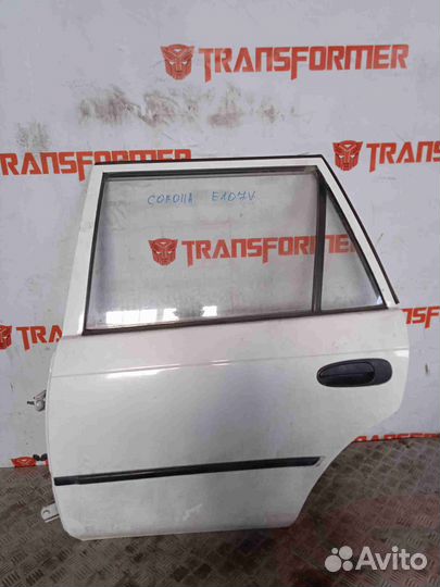 Стекло двери заднее левое Тойота Королла EE107V