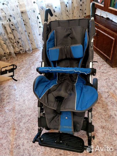 Детская инвалидная коляска для дцп