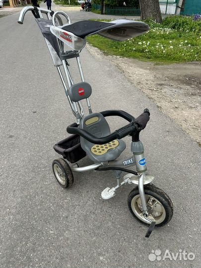 Детский трехколесный велосипед с ручкой