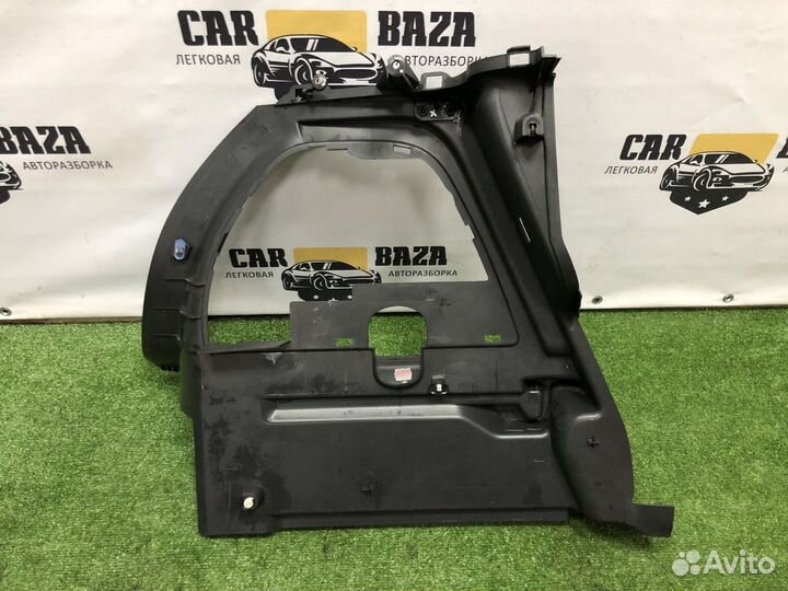 Обшивка багажника R Opel Corsa