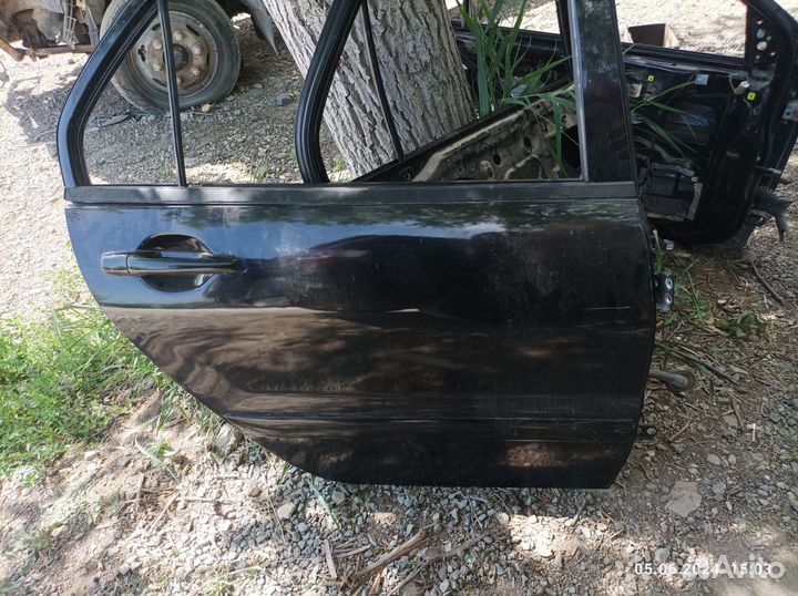 Дверь Mitsubishi Lancer 9