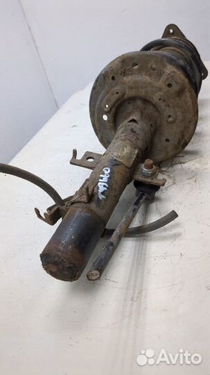 Амортизатор подвески левый передний Nissan Qashqai