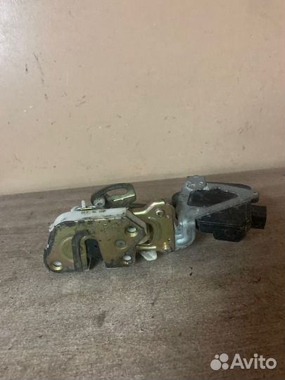 Замок двери задней правой Lancer Cedia