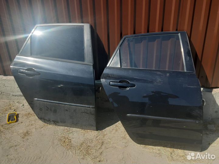 Двери мазда 3 бк ровные, не шпаклеванные