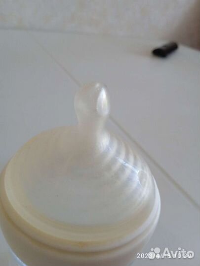 2 Бутылки, соски, градусник для воды