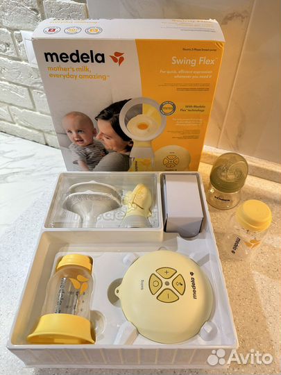Молокоотсос medela swing flex электрический