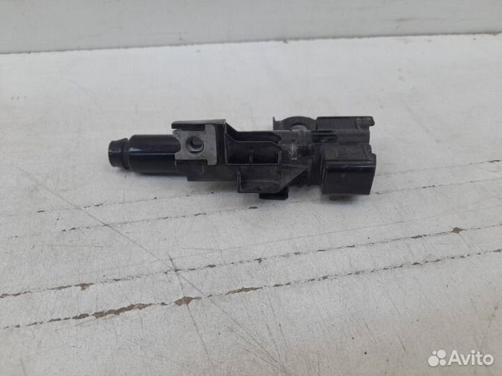 Форсунка омывателя фары передняя левая Subaru