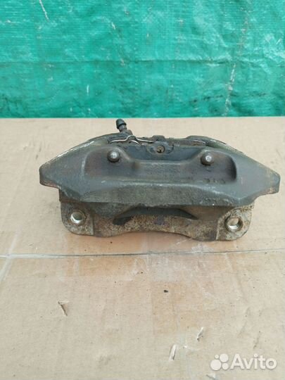 Суппорт тормозной зад левый Pajero Sport 2008-2015