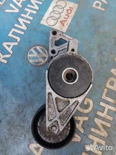 Натяжитель обводного ремня golf 4 1.6.06A903315E