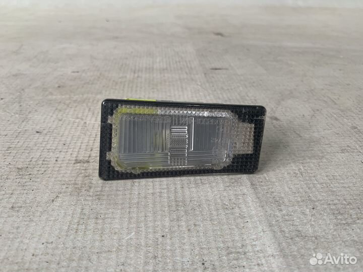 Kia Cerato 13-Фонарь подсветки номера левый