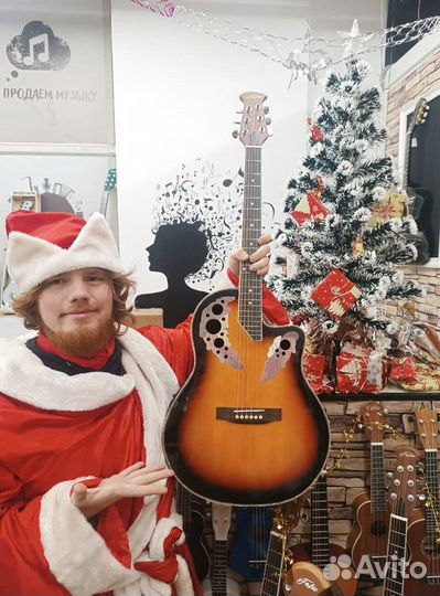 Акустическая гитара для уличных концертов