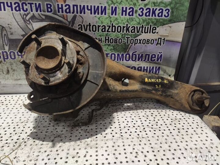 Кулак задний левый Mitsubishi Lancer