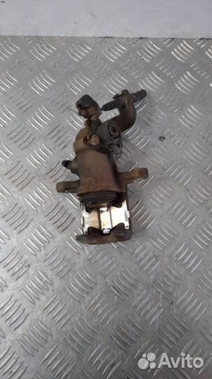 Суппорт тормозной задний левый Hyundai Coupe купе