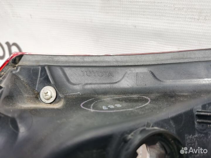 Фонарь наружный левый Toyota Camry 70