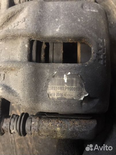 Суппорт левый передний Renault Duster