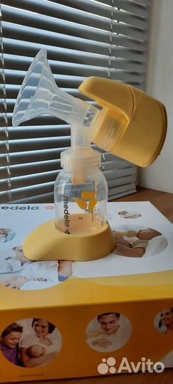 Молокоотсос medela электрический