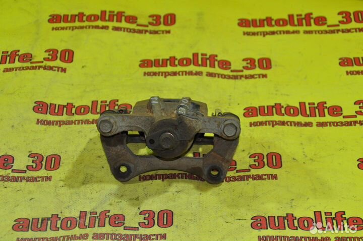 Суппорт задний левый Chevrolet Lacetti