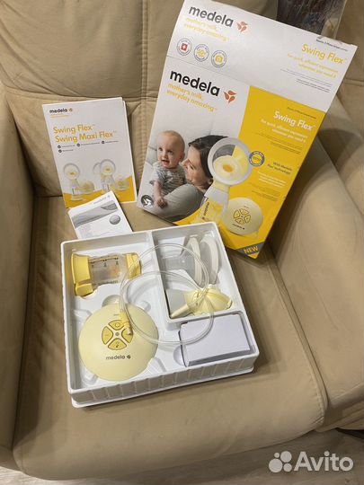 Молокоотсос medela swing flex электрический