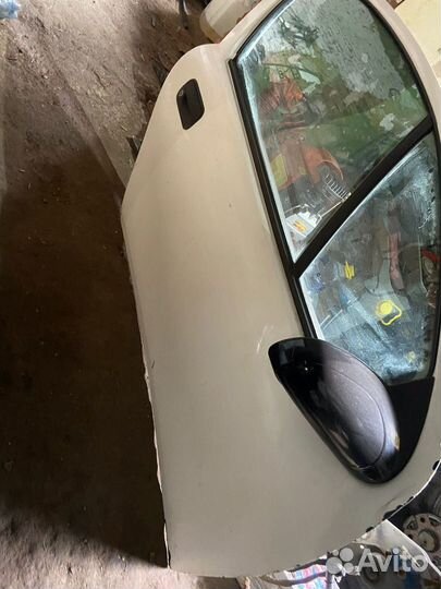 Передние двери Opel tigra в сборе с петлями
