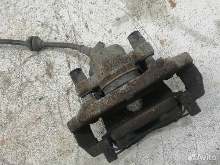 Суппорт передний левый