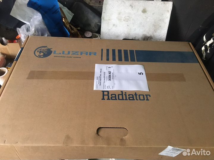 Радиатор форестер сг атмо новый