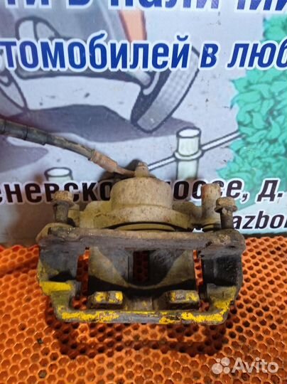 Суппорт передний левый Mazda 6GG 2.0