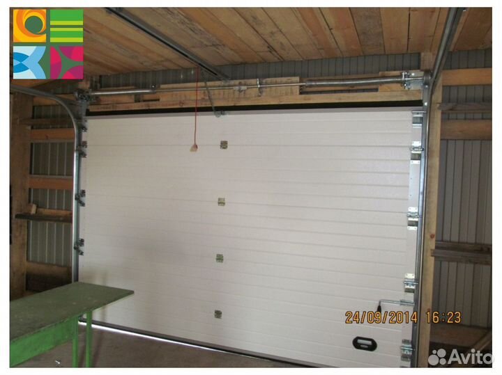 Секционные ворота для гаража alutech
