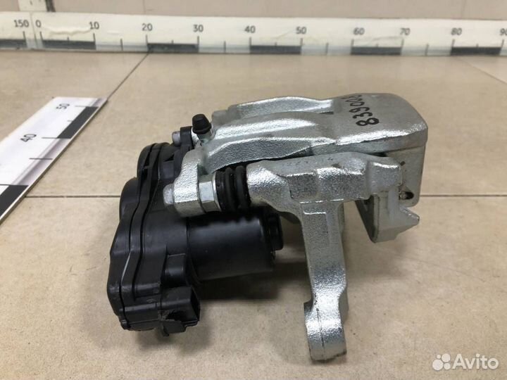 Суппорт задний левый Mitsubishi Outlander