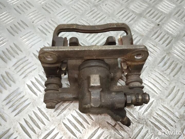 Суппорт тормозной задний левый Mercedes-Benz W169