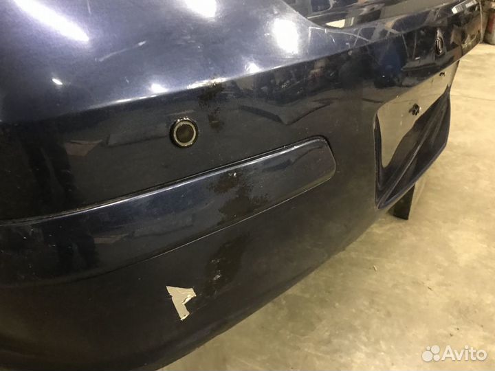 Задний бампер Opel Astra H