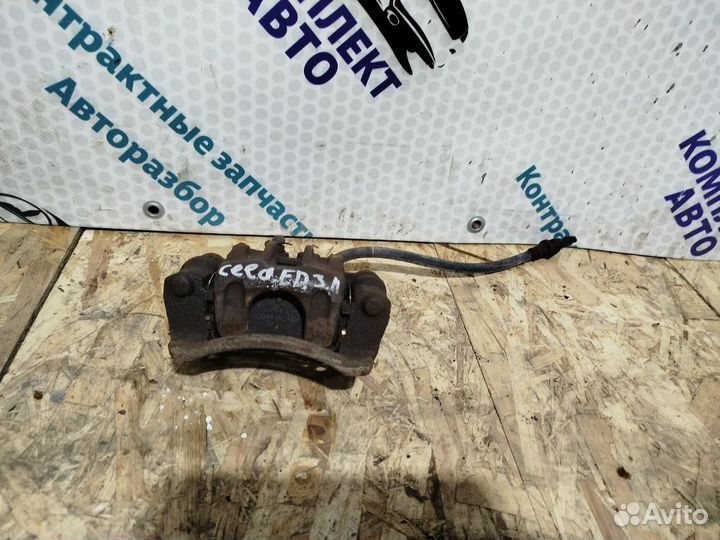 Суппорт задний левый