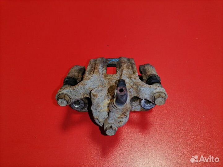 Суппорт задний правый Nissan Pathfinder R51 VQ40DE