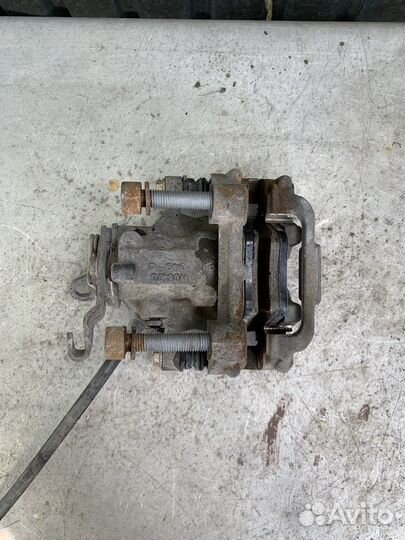 Суппорт зад. левый Mazda 3 BL