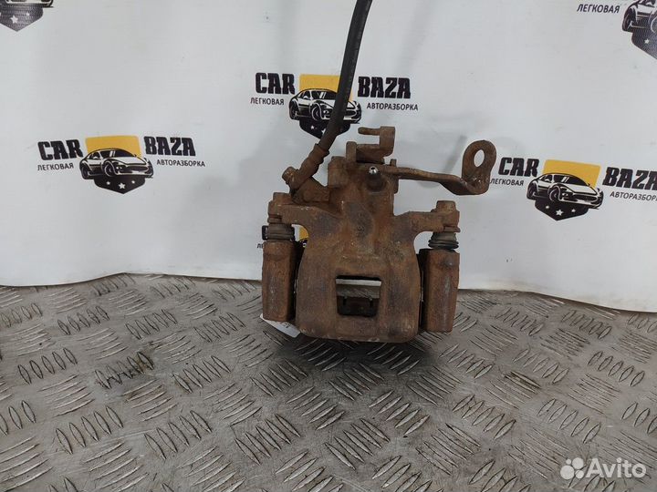 Суппорт тормозной задний правый R Mazda 6