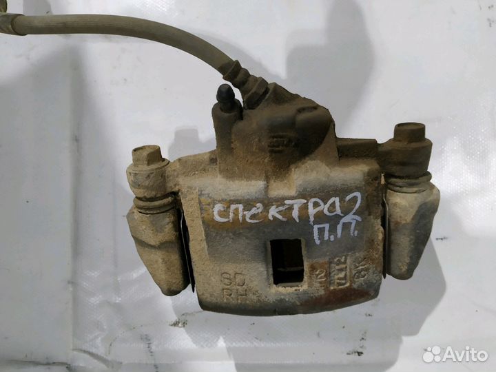 Kia Spectra передний суппорт скоба суппорта