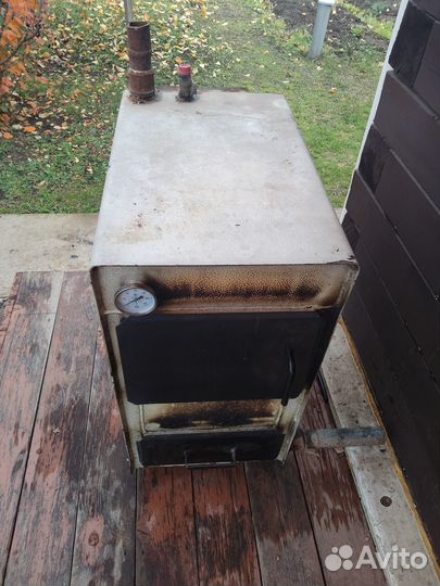 Твердотопливный котел бу Каракан