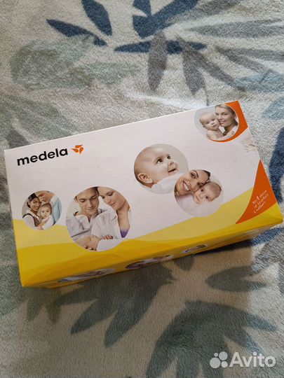 Молокоотсос medela ручной