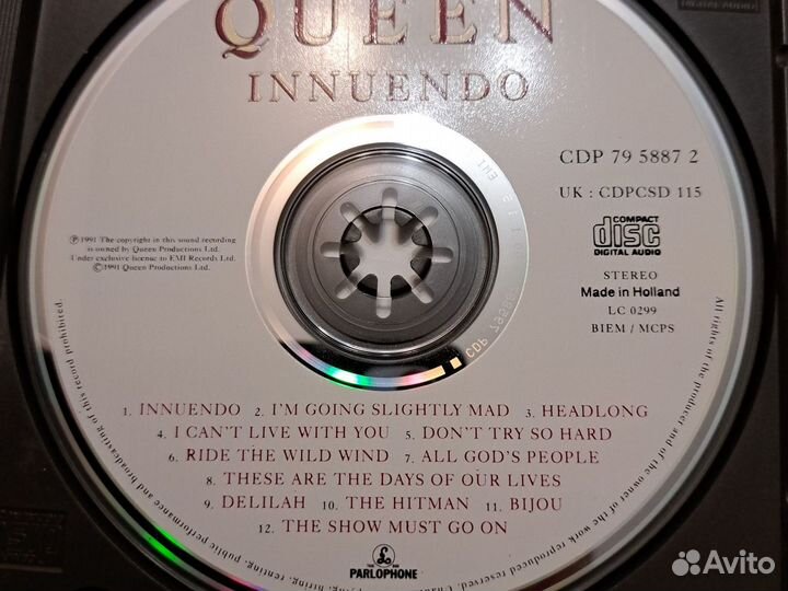 Queen cd innuendo с календарем